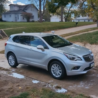 Silver Buick Envision exterior after full detail showing gleaming paint finish